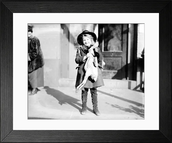 Framed Print : Girl with Thanksgiving turkey, 1919