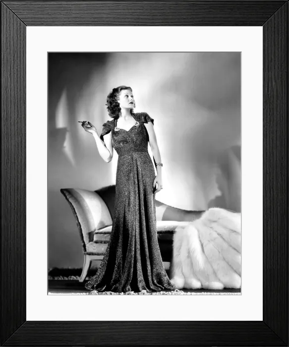 Framed Print : BEAUTY FOR THE ASKING, Lucille Ball, modeling a gold-tissue gown with rhinstone clips and attached cape by Edward Stevenson, 1939