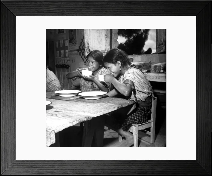 Framed Print : Children from a rural school nesar Lake Atitlan, in Guatemala, are shown enjoying their daily ration of milk, supplied by UNICEF. 1953
