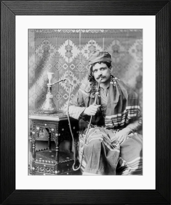 Framed Print : Man smoking water pipe, photograph, 1901