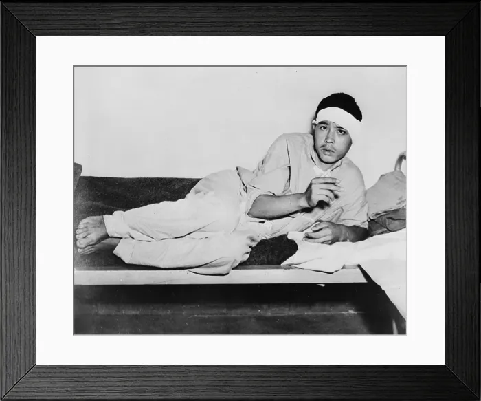Framed Print : World War II, A Japanese prisoner smoking an American cigarette, original caption: Smoking an American cigarette