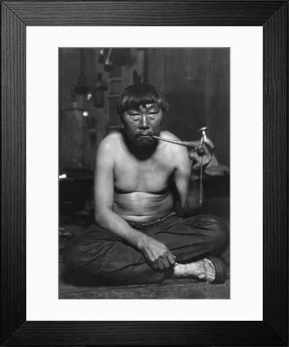 Framed Print : Eskimo smoking pipe, photograph by Lomen Bros. 1900-1927