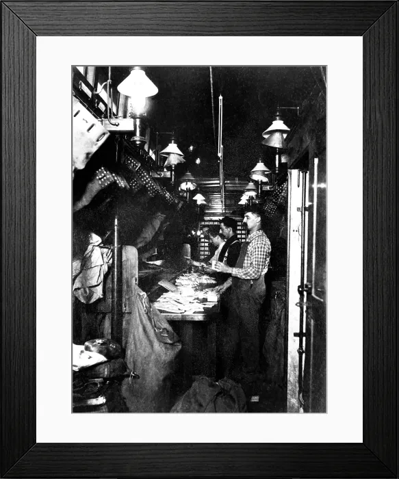 Framed Print : Sorting the mail in a railway post office on a mail train, 1930s.. Courtesy: CSU Archives / Everett Collection Framed Print : Sorting the mail in a railway post office on a mail train, 1930s.. Courtesy: CSU Archives / Everett Collection