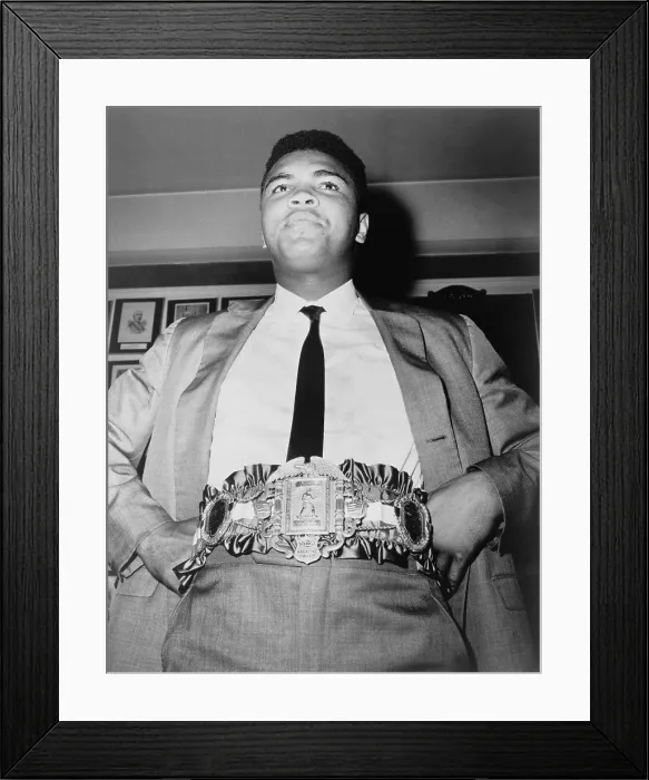 Framed Print : Muhammad Ali (b. 1942), displays the 24-carat gold-plated heavyweight championship belt on Sept. 18 1964. He won the belt on Feb 25, 1964, after his victory over Sonny Liston Framed Print : Muhammad Ali (b. 1942), displays the 24-carat gold-plated heavyweight championship belt on Sept. 18 1964. He won the belt on Feb 25, 1964, after his victory over Sonny Liston