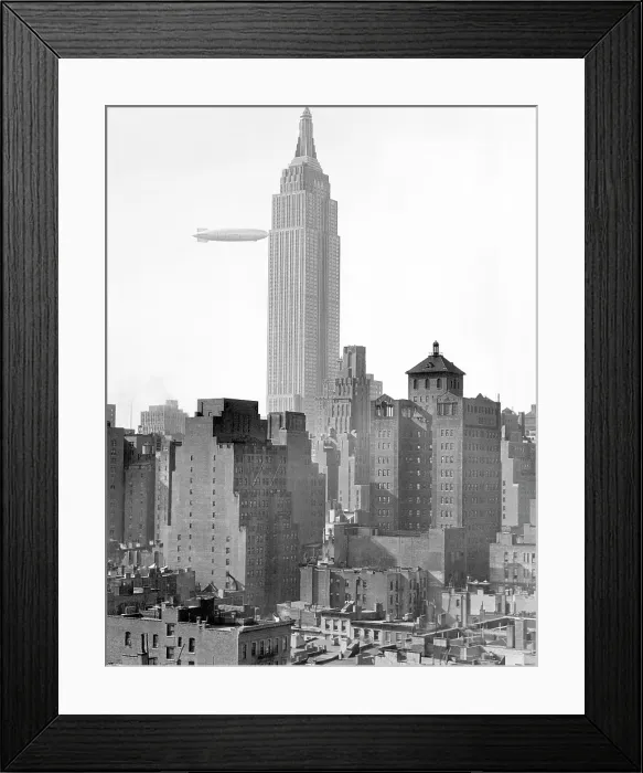 Framed Print : The U.S.S. Akron passing the Empire State Building, New York City, November 3, 1932. Courtesy: CSU Archives / Everett Collection Framed Print : The U.S.S. Akron passing the Empire State Building, New York City, November 3, 1932. Courtesy: CSU Archives / Everett Collection