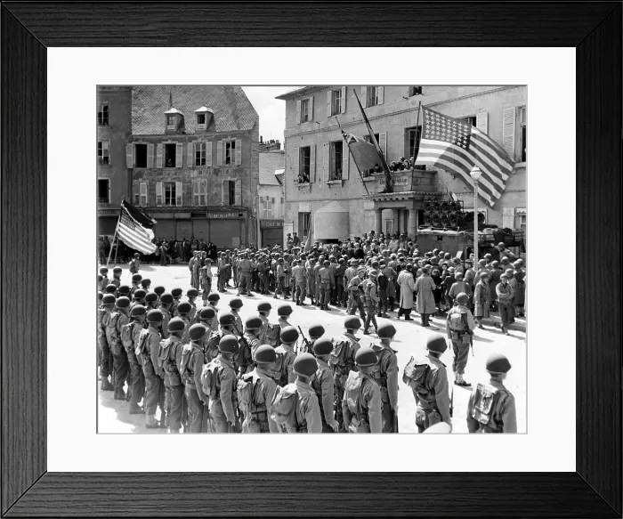 Framed Print : WORLD WAR II, Cherbourg flies under Franch, British and American flags as control of the newly liberated village is returned to its people, June 30, 1944 Framed Print : WORLD WAR II, Cherbourg flies under Franch, British and American flags as control of the newly liberated village is returned to its people, June 30, 1944