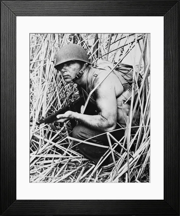 Framed Print : Soldier in grass, circa early 1940s