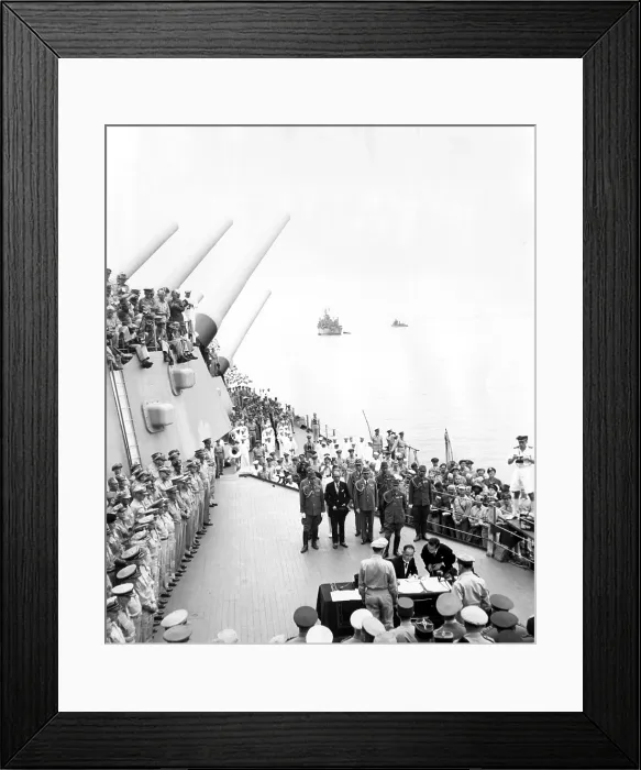 Framed Print : General Douglas MacArthur (back to camera, right), watches as Japanese Foreign Minister Mamoru Shigemitsu signs the document of surrender, ending World War II, Tokyo Bay