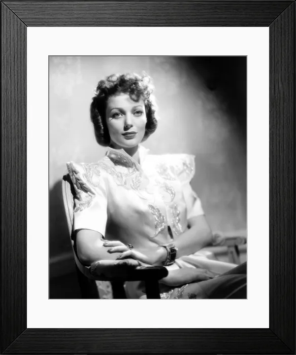 Framed Print : FOUR MEN AND A PRAYER, Loretta Young, in a white slipper-satin dinner ensemble with silver embroidery by Royer, 1938. 20th Century Fox, TM & Copyright / courtesy Everett Collection Framed Print : FOUR MEN AND A PRAYER, Loretta Young, in a white slipper-satin dinner ensemble with silver embroidery by Royer, 1938. 20th Century Fox, TM & Copyright / courtesy Everett Collection