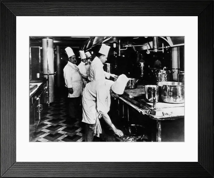 Framed Print : The central kitchen on the SS Normandie cruise ship, in which 76 chefs and more than 100 assistants turned out 4, 000 meals each day, c. 1930s Framed Print : The central kitchen on the SS Normandie cruise ship, in which 76 chefs and more than 100 assistants turned out 4, 000 meals each day, c. 1930s