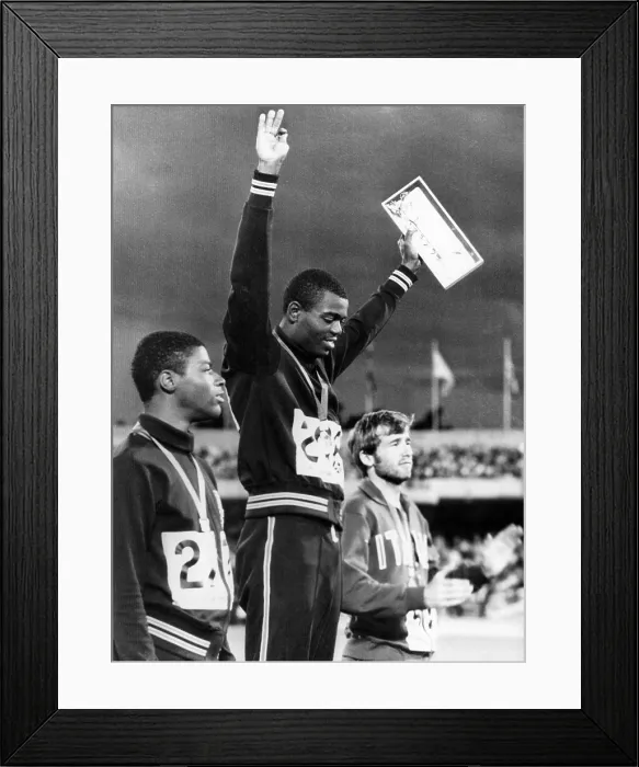 Framed Print : American Willie Davenport wins the gold medal for the 110-meter hurdles in Mexico City. American Ervin Hall won the silver medal and Italian Eddy Ottoz won the bronze, 1968
