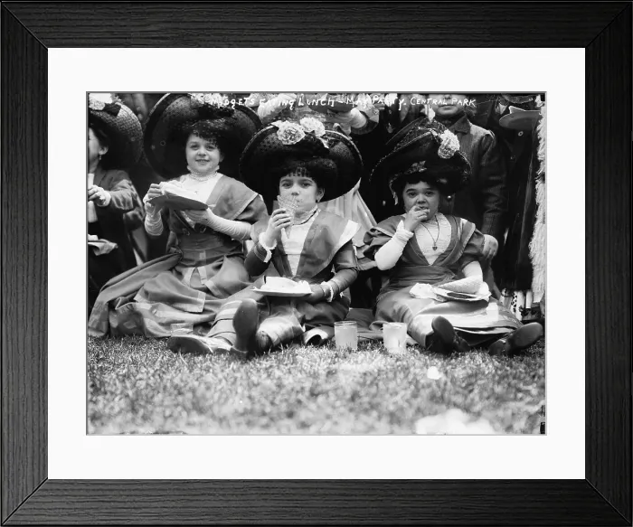 Framed Print : Midgets eating lunch in Central Park, New York City, photograph circa early 1900s