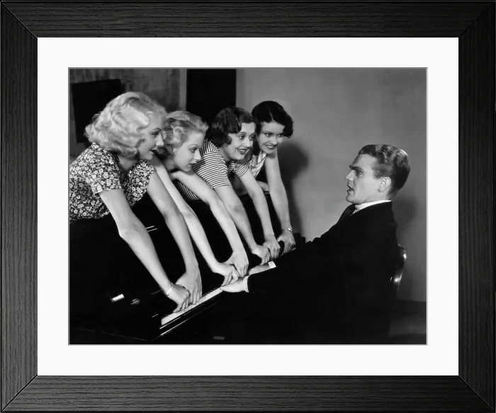 Framed Print : FOOTLIGHT PARADE, James Cagney, getting his fingers slammed by chorus girls, 1933