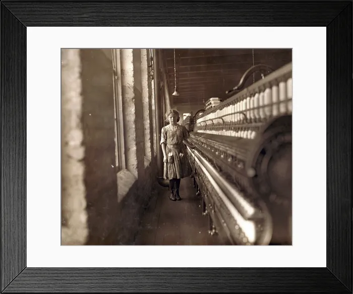 Framed Print : Cotton Mill. An underage girl tends a cotton spinner. Daniel Mfg. Co. Lincolnton, North Carolina. Photo by Lewis Hine Wickes, Nov 1908 Framed Print : Cotton Mill. An underage girl tends a cotton spinner. Daniel Mfg. Co. Lincolnton, North Carolina. Photo by Lewis Hine Wickes, Nov 1908
