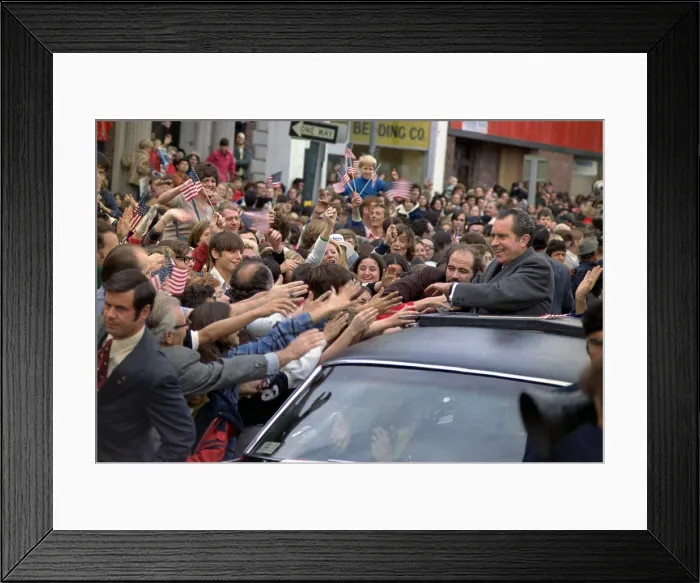 Framed Print : President Richard M. Nixon's motorcade being swarmed by people during a campaign event. 1972