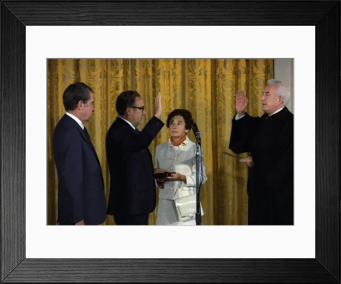 Framed Print : Henry Kissinger being sworn in as Secretary of State by Chief Justice Warren Burger