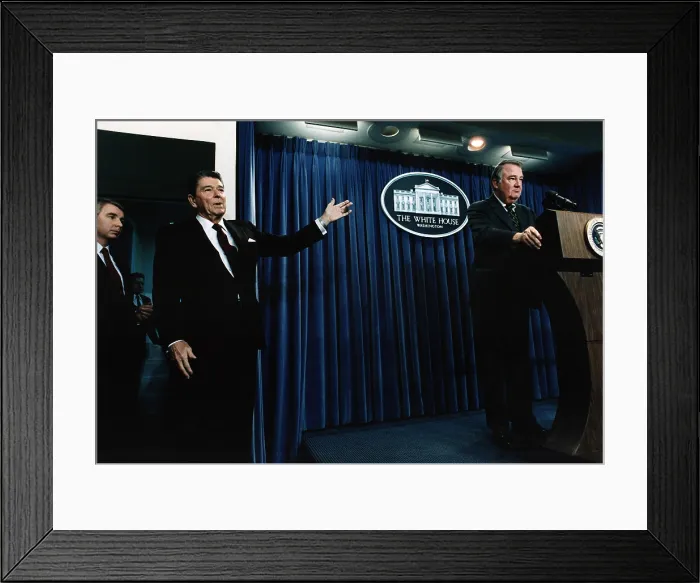 Framed Print : Ronald Reagan. President Reagan motioning to Attorney General Ed Meese during a White House Press Briefing on Iran-Contra. The White House, Washington, D.C. 1986 Framed Print : Ronald Reagan. President Reagan motioning to Attorney General Ed Meese during a White House Press Briefing on Iran-Contra. The White House, Washington, D.C. 1986