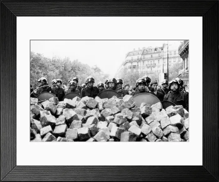 Framed Print : Police behind a barricade made of stones by rioting students in the Latin Quarter of Paris, France, 1960s.. Courtesy: CSU Archives  /  Everett Collection