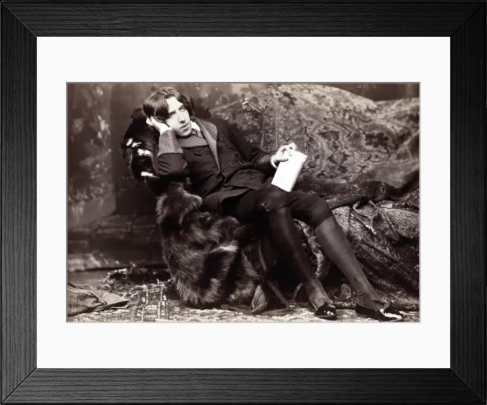 Framed Print : Oscar Wilde, (1854-1900) Irish literary genuis, in flamboyant costume. 1882 studio portait by Napoleon Sarony Framed Print : Oscar Wilde, (1854-1900) Irish literary genuis, in flamboyant costume. 1882 studio portait by Napoleon Sarony