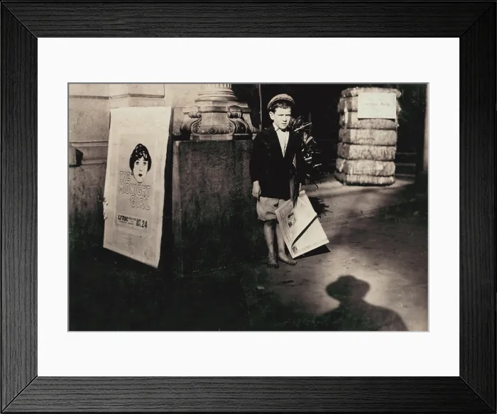 Framed Print : Child labor, a newsie, from original caption: There are a number of these young newsboys in the Alabama cities, Mobile, Alabama, photograph by Lewis Wickes Hine