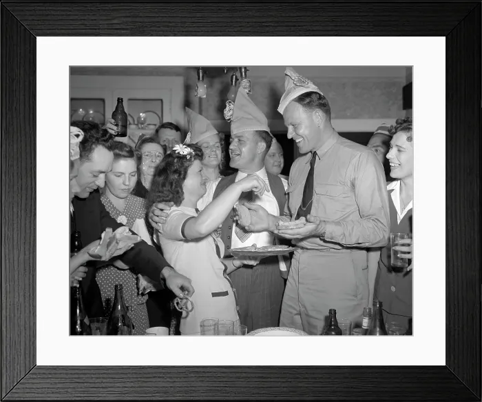 Framed Print : World War II, George Woolslayer (center), soldier and sailor with a party at his home, friends, relatives and fellow workers made up the list of guests, Mrs
