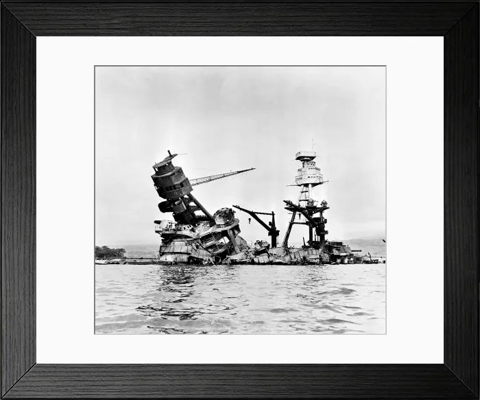 Framed Print : After the fire. Battered by aerial torpedoes and bomb hits, the USS Arizona rests on the bottom of Pearl Harbor. December 7, 1941 Framed Print : After the fire. Battered by aerial torpedoes and bomb hits, the USS Arizona rests on the bottom of Pearl Harbor. December 7, 1941