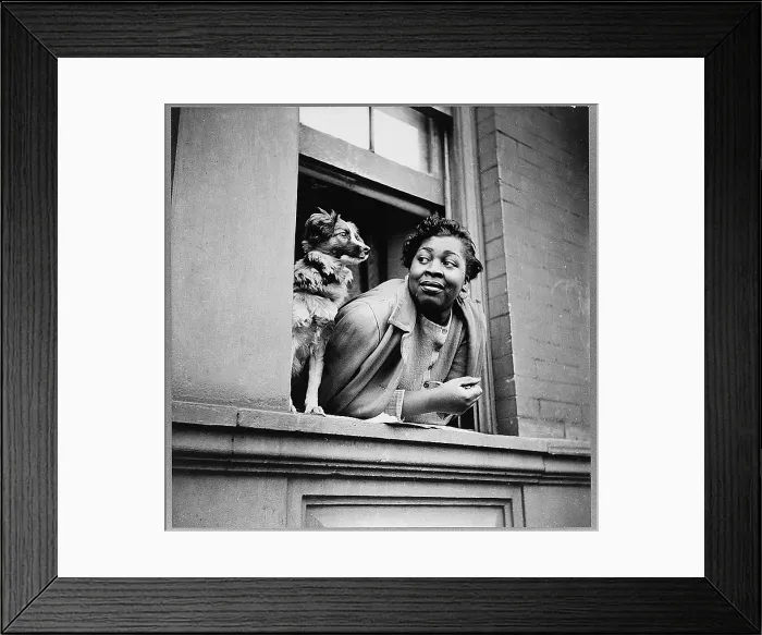 Framed Print : Woman with her dog in Harlem, New York City, May 1943
