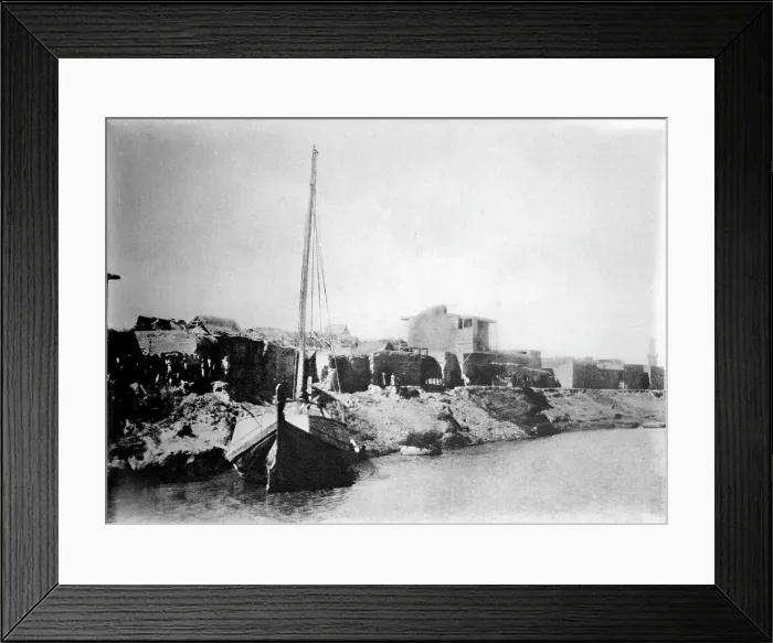 Framed Print : Iraq, A small sail boat anchored on the shore of the Tigris River near Kut-El-Amara, circa 1920s Framed Print : Iraq, A small sail boat anchored on the shore of the Tigris River near Kut-El-Amara, circa 1920s