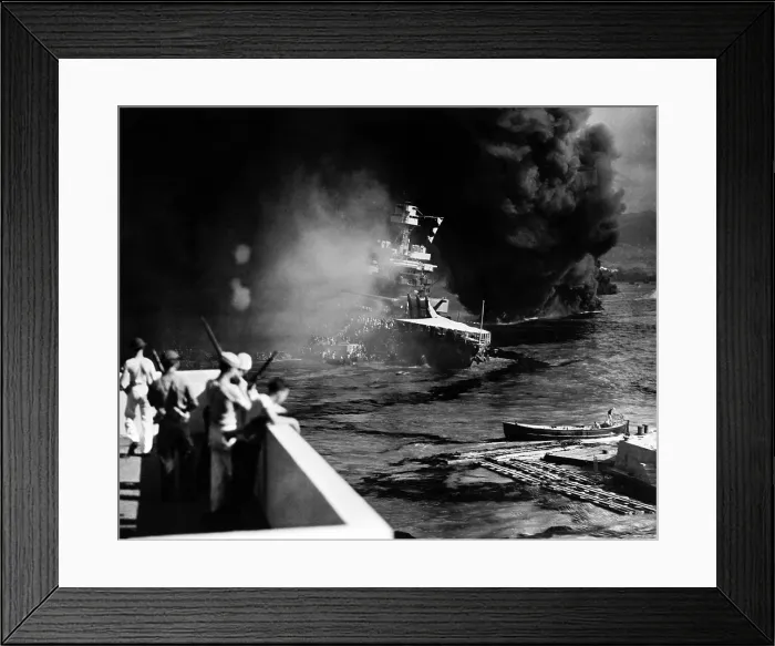 Framed Print : Pearl Harbor: Battered by aerial bombs and torpedoes, the U.S.S. California is evacuated as sailors and soldiers look on, December 7, 1941