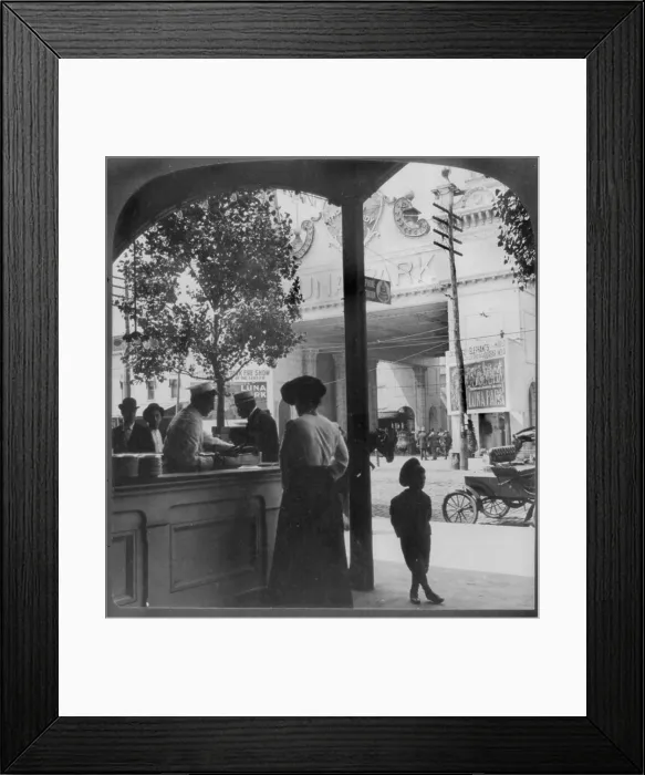Framed Print : Coney Island, woman at hot dog stand outside Luna Park, original title: The Hot Dog Man opposite Luna Park Entrance, New York City, stereo photograph, 1904