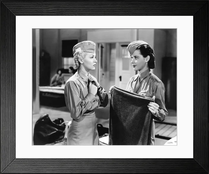 Framed Print : KEEP YOUR POWDER DRY, from left: Lana Turner, Susan Peters, 1945