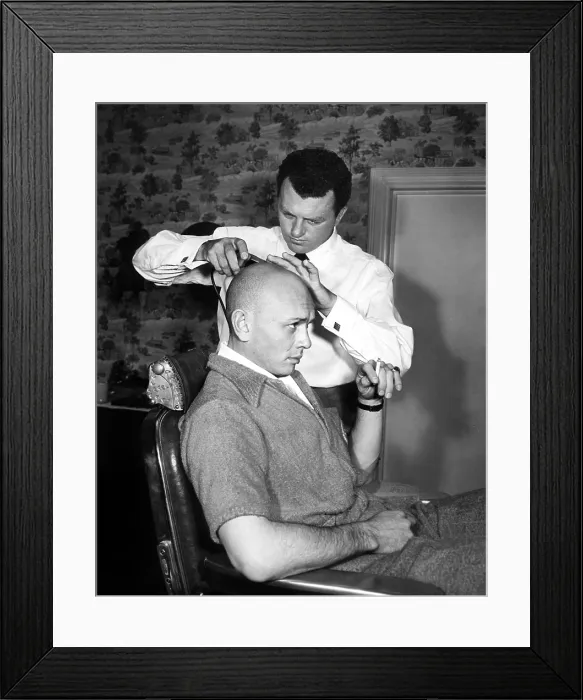 Framed Print : Yul Brynner getting shaved by Makeup Artist Robert Dawn for his role in THE KING & I, 1956, TM and Copyright 20th Century Fox Film Corp Framed Print : Yul Brynner getting shaved by Makeup Artist Robert Dawn for his role in THE KING & I, 1956, TM and Copyright 20th Century Fox Film Corp