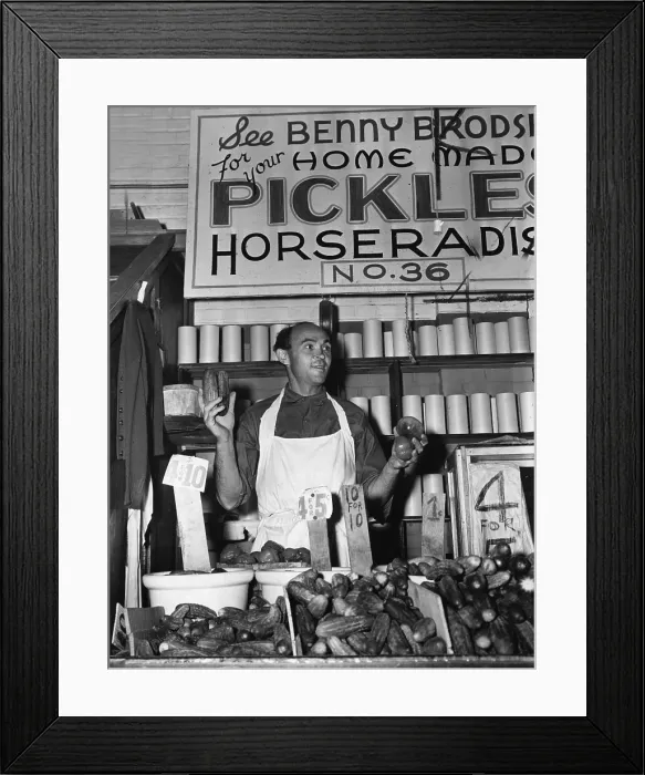 Framed Print : New York City, Benny Brodsky, pushcart vendor, at his stand, photograph, 1940