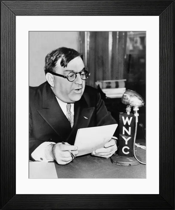 Framed Print : New York City, Mayor Fiorello La Guardia (1882-1947), speaks over WNYC on grade A milk from budget room, photograph by Fred Palumbo, March 23, 1940