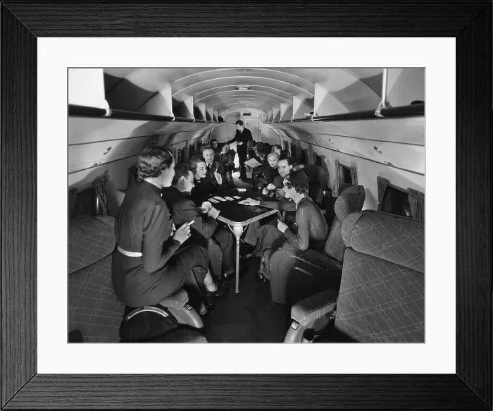 Framed Print : Passengers play cards on United Airline's Skylounge Mainliner, 1937. Courtesy: CSU Archives / Everett Collection