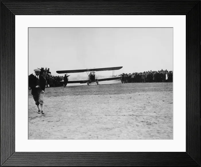 Framed Print : Leon D. Cuddeback of United Airlines takes off in his Swallow airplane from Boise, Idaho with 202 pounds of mail in the first scheduled airline flight in history, April 6, 1926