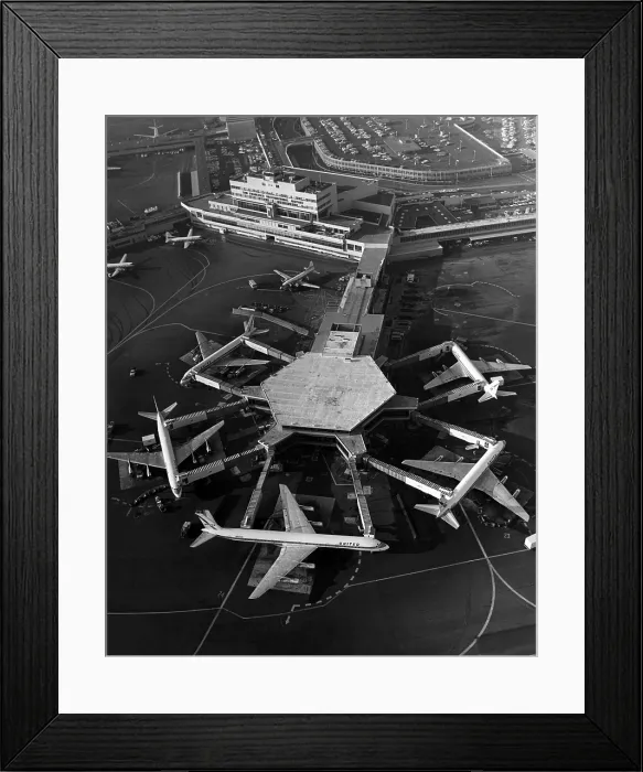 Framed Print : A Super DC-8 airplane (bottom) sits at the United Airlines terminal at the San Francisco International Airport, 1967. Courtesy: CSU Archives / Everett Collection Framed Print : A Super DC-8 airplane (bottom) sits at the United Airlines terminal at the San Francisco International Airport, 1967. Courtesy: CSU Archives / Everett Collection