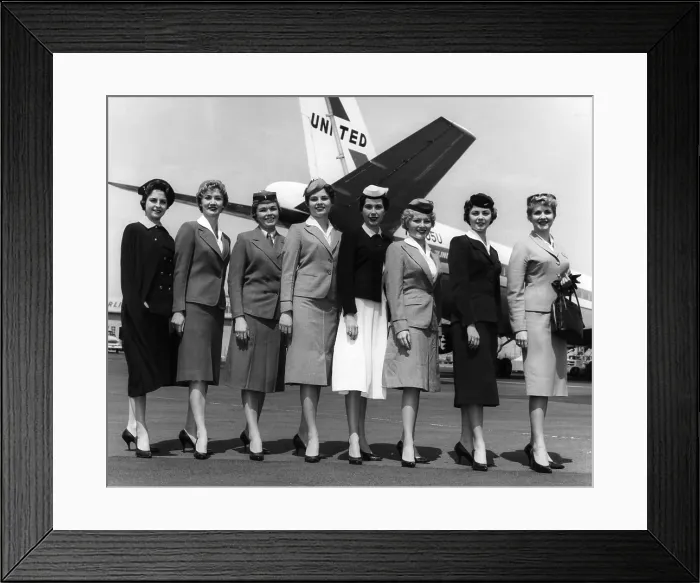 Framed Print : United Airline's stewardesses model thirty years of uniforms