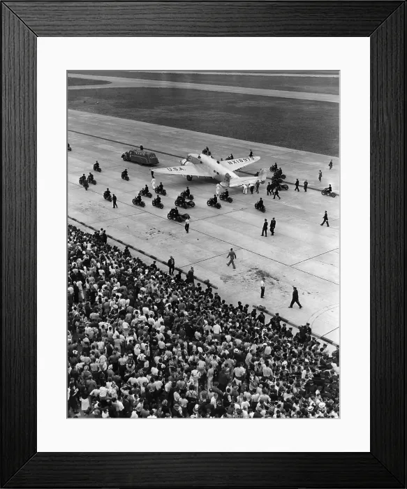 Framed Print : Howard Hughes and four companions taxi to a stop in the plane that took them around the world, Floyd Bennett Field, New York, 1938. Courtesy: CSU Archives / Everett Collection