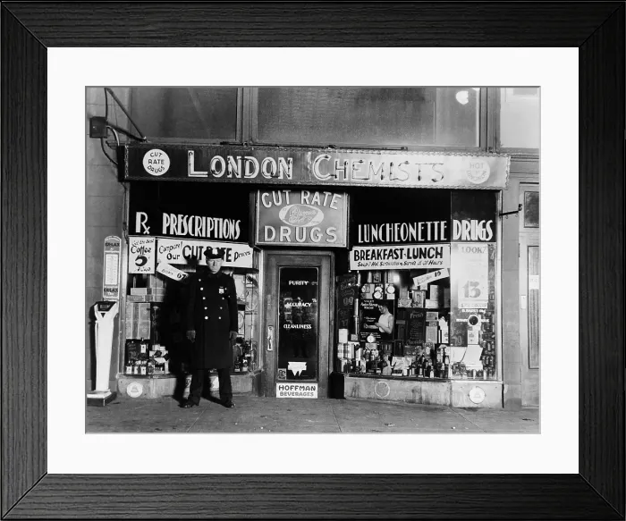 Framed Print : A New York City policeman guarding the crime scene where gangster Vincent Coll was murdered by Dutch Schultz's assassins at Eighth Avenue and 23rd Street. February 8, 1932 Framed Print : A New York City policeman guarding the crime scene where gangster Vincent Coll was murdered by Dutch Schultz's assassins at Eighth Avenue and 23rd Street. February 8, 1932
