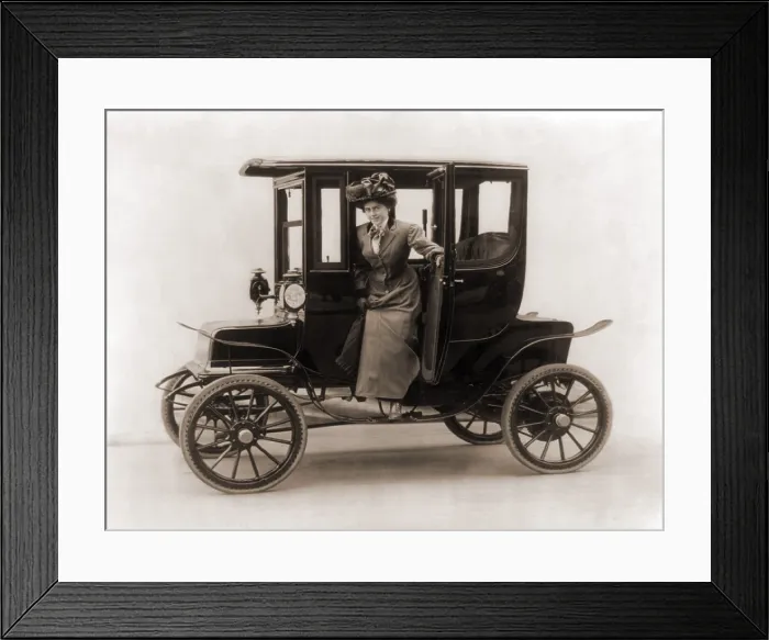 Framed Print : Women steps from an electric car. 1908 Framed Print : Women steps from an electric car. 1908