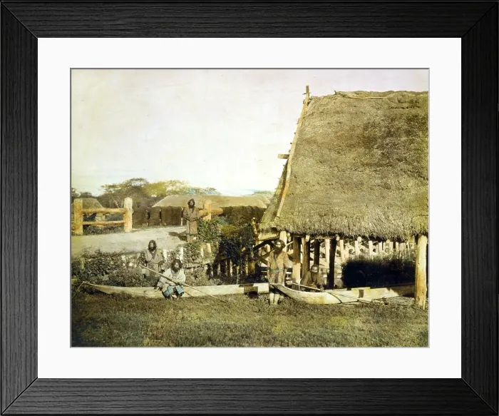 Framed Print : Four Ainu men with two boats, by a thatched roof building on the island Hokkiado, Japan, circa 1890-1900