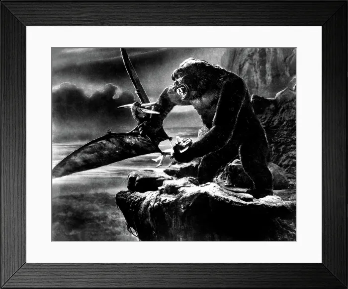 Framed Print : KING KONG, 1933, holding Fay Wray and fighting giant flying lizard