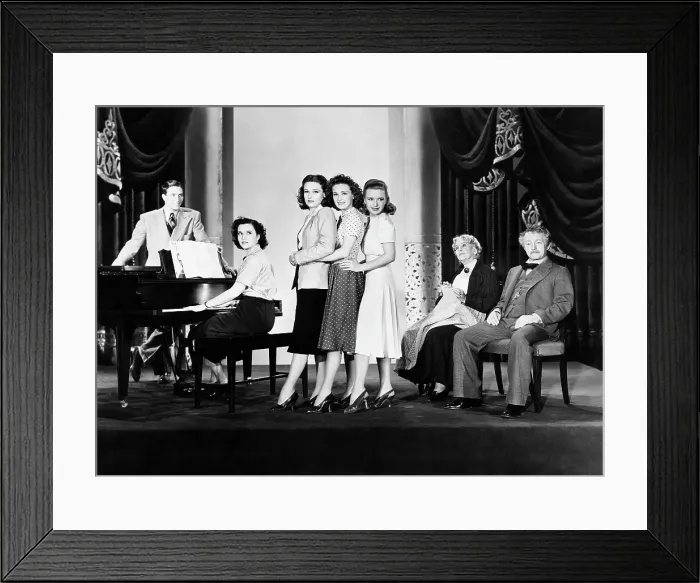 Framed Print : FOUR DAUGHTERS, Jeffrey Lynn (standing left), Gale Page (at piano), standing center from left: Lola Lane, Rosemary Lane, Priscilla Lane, seated right from left: May Robson
