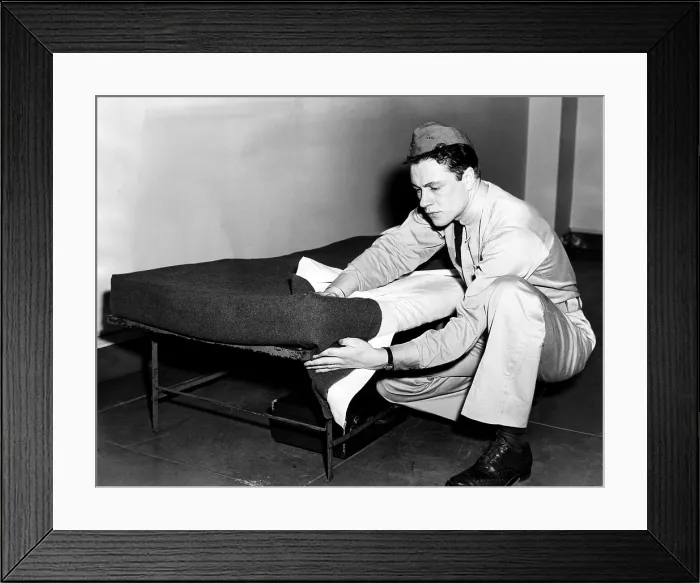 Framed Print : An army recruit learning how to make his bed in order to pass inspection, April, 1941.. Courtesy: CSU Archives / Everett Collection Framed Print : An army recruit learning how to make his bed in order to pass inspection, April, 1941.. Courtesy: CSU Archives / Everett Collection