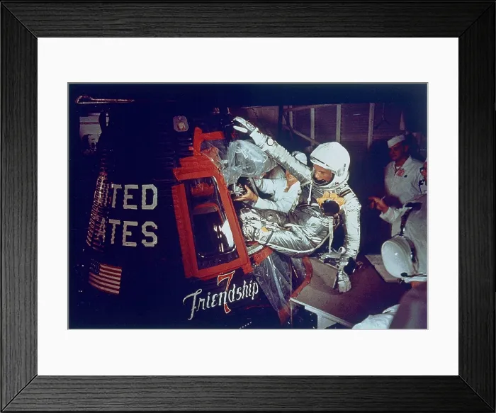 Framed Print : Overall view of astronaut John Glenn, Jr. (Lt. Colonel, USMC) as he enters into the spacecraft Friendship 7 prior to the first American manned Earth orbital mission