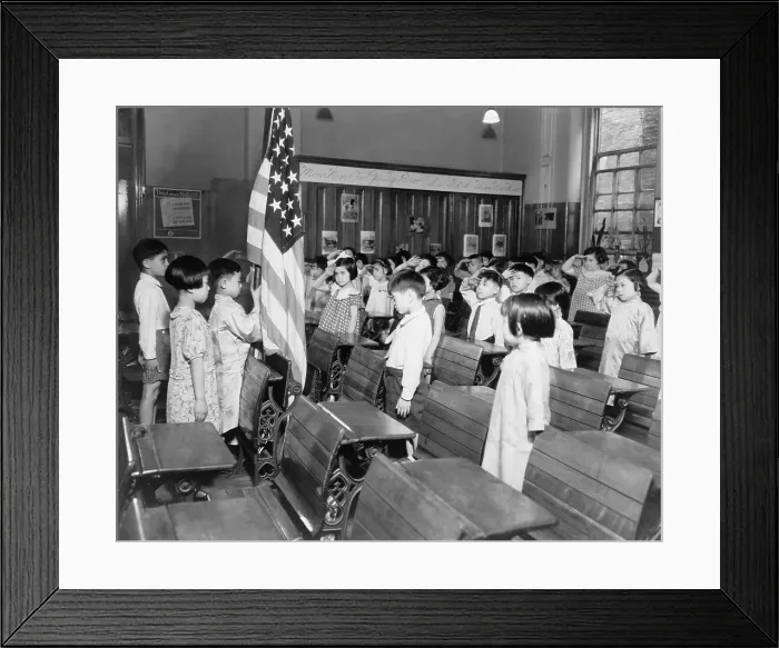 Framed Print : Class with several Asian American children saluting the American flag while reciting the Pledge of Allegiance in New York City's Public School #23 on the Lower East Side of Framed Print : Class with several Asian American children saluting the American flag while reciting the Pledge of Allegiance in New York City's Public School #23 on the Lower East Side of