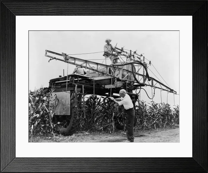 Framed Print : Large-scale spraying of Syndeet, an insecticide containing DDT, on a farm in Illinois in 1948