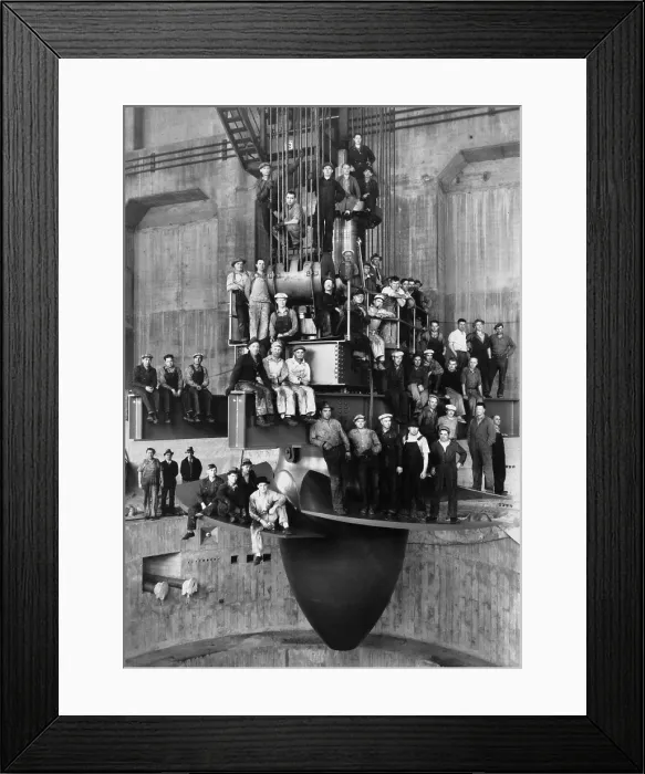 Framed Print : Workmen pose for a group portrait on the giant turbine in the powerhouse of the Bonneville Dam. Ca. 1937 Framed Print : Workmen pose for a group portrait on the giant turbine in the powerhouse of the Bonneville Dam. Ca. 1937