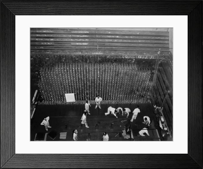Framed Print : Workers laying up the graphite core of the Reactor-B atomic pile. The pile was 36 feet high, measuring 28 by 36 feet Framed Print : Workers laying up the graphite core of the Reactor-B atomic pile. The pile was 36 feet high, measuring 28 by 36 feet